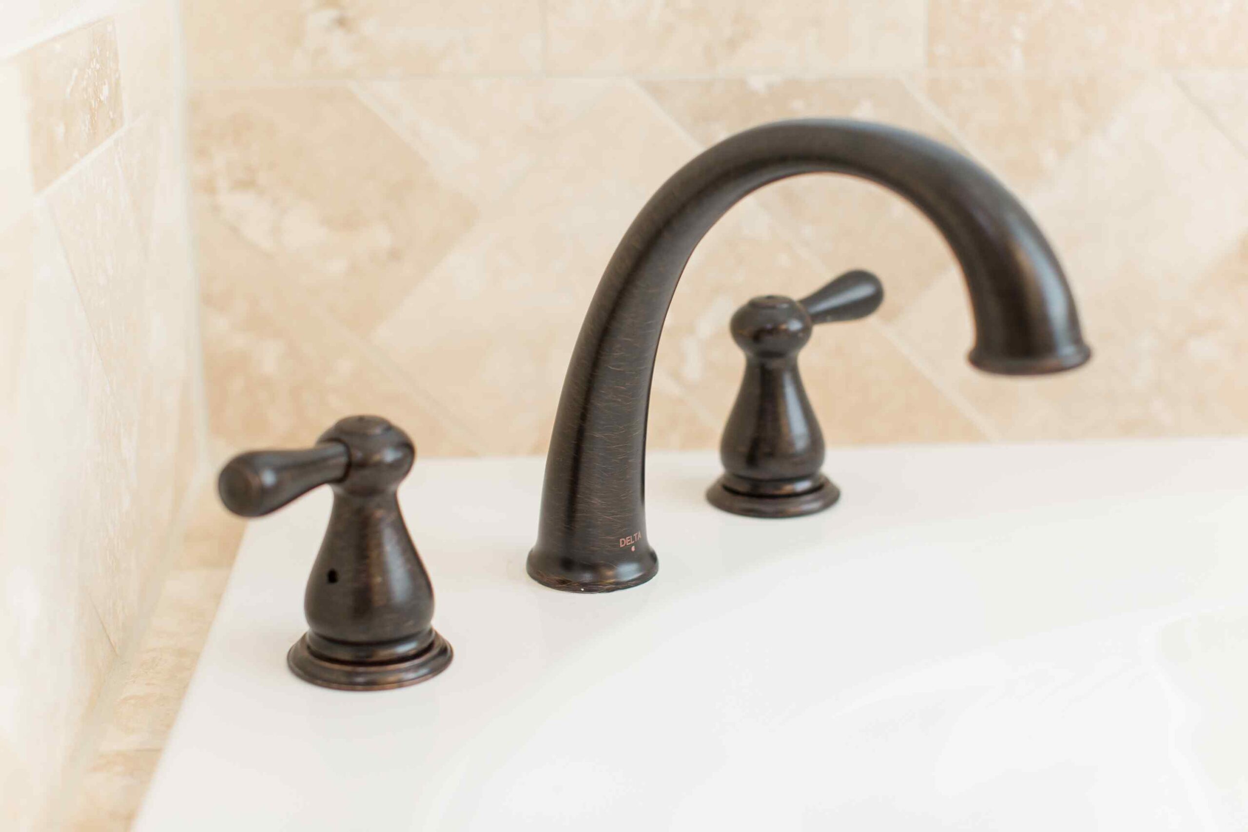 Modern Blu bathrooms brass faucet - Also offers Attic Renovation in Flower Mound TX