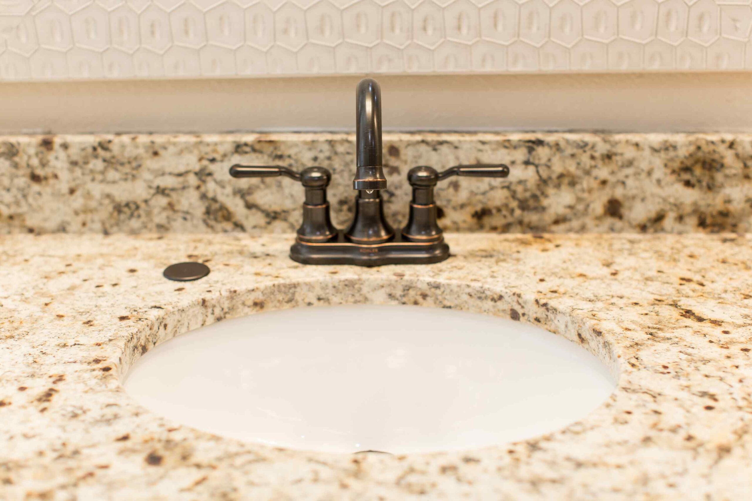 Modern Blu bathrooms marble sink - also offering Attic Renovation in Flower Mound TX