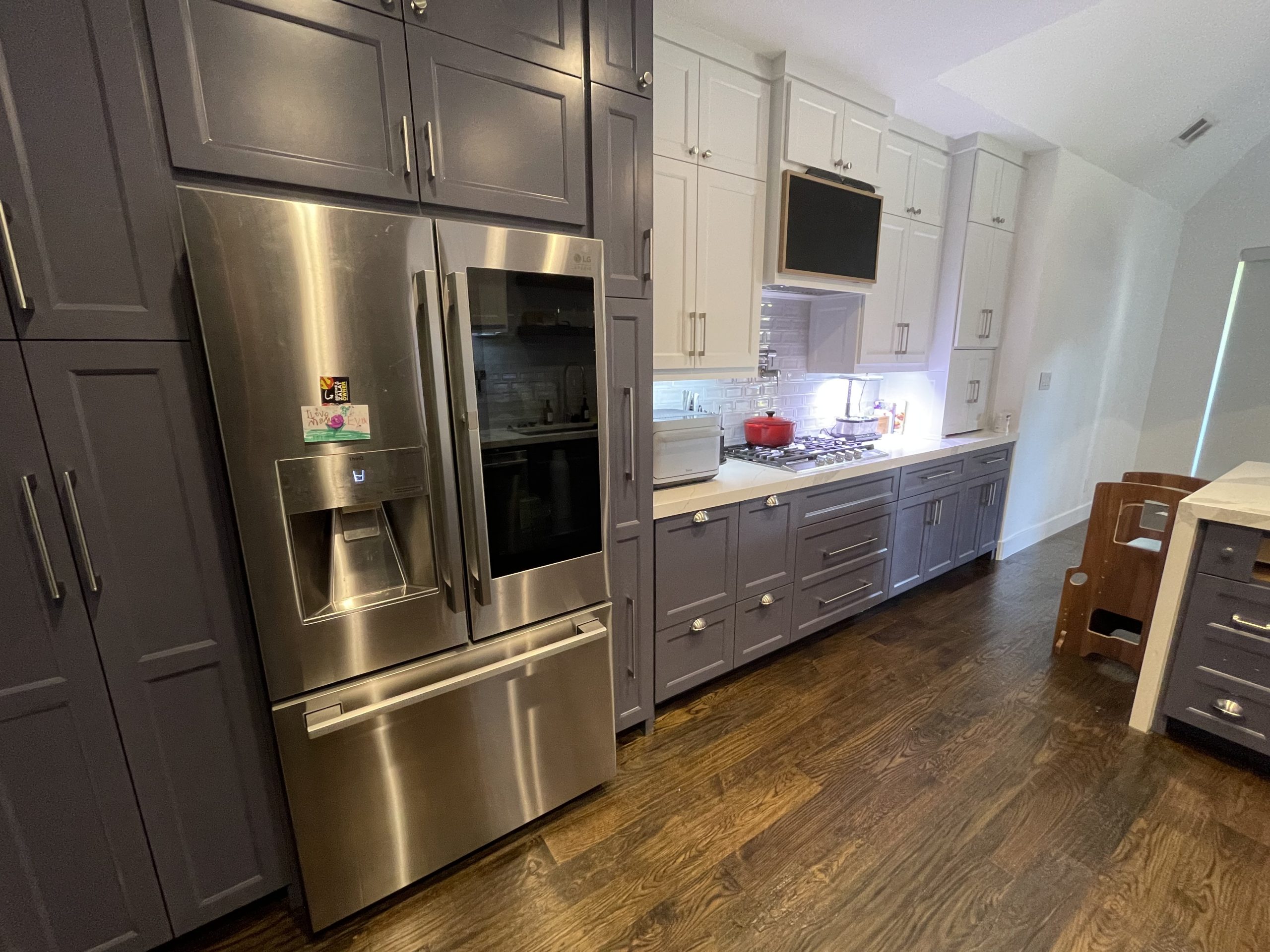 Kitchen Remodeling Project with Quartz countertop, sub zero fridge, commercial gas cook top